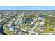 Aerial view showcasing a single Gathering home's location in a residential neighborhood at 2 Broadmoor Rd, Rotonda West, FL 33947