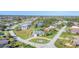 Aerial view of a single-Gathering home with a large backyard and pool at 2 Broadmoor Rd, Rotonda West, FL 33947
