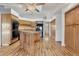 Kitchen with granite island and wood cabinets at 2 Broadmoor Rd, Rotonda West, FL 33947