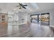 Bright living area with sliding doors leading to the pool area at 2 Broadmoor Rd, Rotonda West, FL 33947