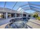 Relaxing pool and spa with screened enclosure at 2 Broadmoor Rd, Rotonda West, FL 33947