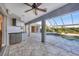 Covered patio with pool access and built-in bar at 2 Broadmoor Rd, Rotonda West, FL 33947