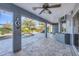 Spacious patio with pool view and ceiling fan at 2 Broadmoor Rd, Rotonda West, FL 33947