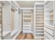 Large walk-in closet with ample shelving and hanging space at 2 Broadmoor Rd, Rotonda West, FL 33947