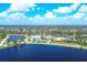 Aerial view of community with lake and homes at 2 Marker Rd, Rotonda West, FL 33947