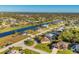 Aerial view of residential neighborhood with canal at 2 Marker Rd, Rotonda West, FL 33947