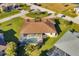 Aerial view of the house, pool, and surrounding landscape at 2 Marker Rd, Rotonda West, FL 33947