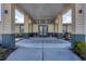 Covered entrance to community building with seating at 2 Marker Rd, Rotonda West, FL 33947