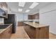 Well-equipped community kitchen with granite countertops at 2 Marker Rd, Rotonda West, FL 33947