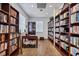Well-stocked library with ample shelving and workspaces at 2 Marker Rd, Rotonda West, FL 33947