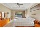 Main bedroom with direct access to the pool area at 2 Marker Rd, Rotonda West, FL 33947