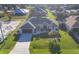 Aerial view of the house and driveway at 213 White Marsh Ln, Rotonda West, FL 33947