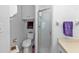 Bathroom boasts white toilet, vanity, and shower with glass door at 2673 Titania Rd, Englewood, FL 34224