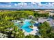 Aerial view of a community pool with surrounding amenities at 26790 Weiskopf Dr, Englewood, FL 34223