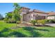 House exterior showcasing landscaping and a brick driveway at 26790 Weiskopf Dr, Englewood, FL 34223