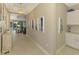 Bright hallway with light walls and access to other rooms at 26790 Weiskopf Dr, Englewood, FL 34223