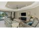 Spacious living room with comfy seating and pool view at 26790 Weiskopf Dr, Englewood, FL 34223