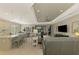 Open concept living space with kitchen, dining, and living room at 26790 Weiskopf Dr, Englewood, FL 34223