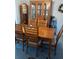 Dining room features a wood table and matching hutch at 3090 Lockwood St, Port Charlotte, FL 33952