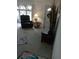 Relaxing living room with comfortable seating and large windows at 3090 Lockwood St, Port Charlotte, FL 33952