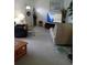 Spacious living room with comfortable seating and a large TV at 3090 Lockwood St, Port Charlotte, FL 33952