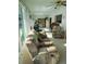 Bright and airy living room with large windows and comfy seating at 3090 Lockwood St, Port Charlotte, FL 33952
