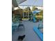 Relaxing screened pool deck with patio furniture at 3090 Lockwood St, Port Charlotte, FL 33952