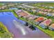 Aerial view of a luxury waterfront community with single-Gathering homes at 3179 Osprey Ln, Port Charlotte, FL 33953