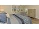 King bedroom with light wood furniture and access to a private patio at 3179 Osprey Ln, Port Charlotte, FL 33953