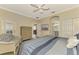 Guest bedroom with king bed and adjacent bathroom access at 3179 Osprey Ln, Port Charlotte, FL 33953