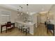 Modern kitchen with breakfast bar and light cabinetry at 3179 Osprey Ln, Port Charlotte, FL 33953