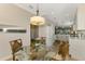 Bright kitchen with white cabinets, quartz countertops, and stainless steel appliances at 3179 Osprey Ln, Port Charlotte, FL 33953