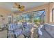 Spacious lanai with seating area and spa at 3179 Osprey Ln, Port Charlotte, FL 33953