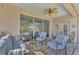 Covered lanai with seating and view of canal at 3179 Osprey Ln, Port Charlotte, FL 33953