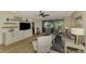 Relaxing living room with comfy seating and view of the patio at 3179 Osprey Ln, Port Charlotte, FL 33953