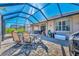 Spacious paver patio with seating area, adjacent to the house at 3179 Osprey Ln, Port Charlotte, FL 33953