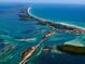 Aerial view of coastal area with waterways and bridge at 445 Stewart St, Englewood, FL 34223