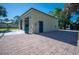 Detached workshop with paver driveway at 445 Stewart St, Englewood, FL 34223