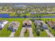 Aerial view of a single Gathering home with a large backyard and canal access at 634 Boundary Blvd, Rotonda West, FL 33947