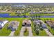 Aerial view of a canal-front property in a residential area at 634 Boundary Blvd, Rotonda West, FL 33947