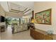 Inviting entryway with a statement art piece and built-in dresser at 634 Boundary Blvd, Rotonda West, FL 33947