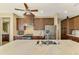 Island kitchen with stainless steel appliances and granite countertops at 634 Boundary Blvd, Rotonda West, FL 33947