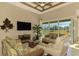 Spacious living room featuring ample natural light and comfortable seating at 634 Boundary Blvd, Rotonda West, FL 33947