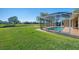 Enjoy the screened in pool and backyard at 634 Boundary Blvd, Rotonda West, FL 33947
