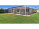 Screened pool and patio area, perfect for outdoor fun at 634 Boundary Blvd, Rotonda West, FL 33947