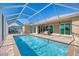 Enjoy this refreshing, screened-in pool at 634 Boundary Blvd, Rotonda West, FL 33947