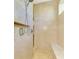 Large walk-in shower with tiled walls and built-in seat at 634 Boundary Blvd, Rotonda West, FL 33947