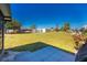 Large backyard with grassy area and patio at 6379 Coliseum Blvd, Port Charlotte, FL 33981