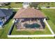 Home with a private screened pool and fenced backyard at 76 Long Meadow Ct, Rotonda West, FL 33947