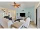 Bright and airy living room with a comfortable seating arrangement at 76 Long Meadow Ct, Rotonda West, FL 33947